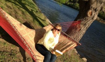 Lois Alter Mark relaxes in a hammock at the Lake Austin Spa