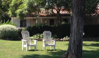 Inn at RSF chairs under tree